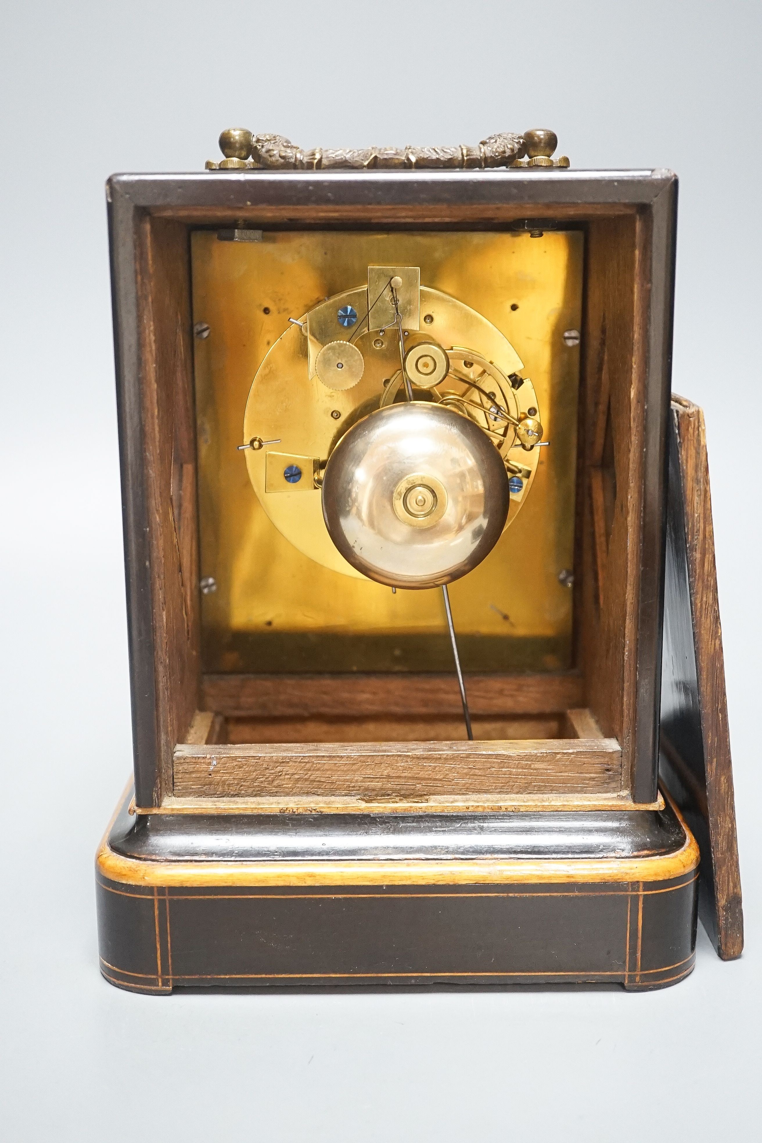 A 19th century French mahogany cased mantel clock, key and pendulum